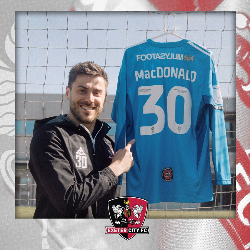Exeter City goalkeeper Shaun MacDonald signs a new one-year contract at the club 
